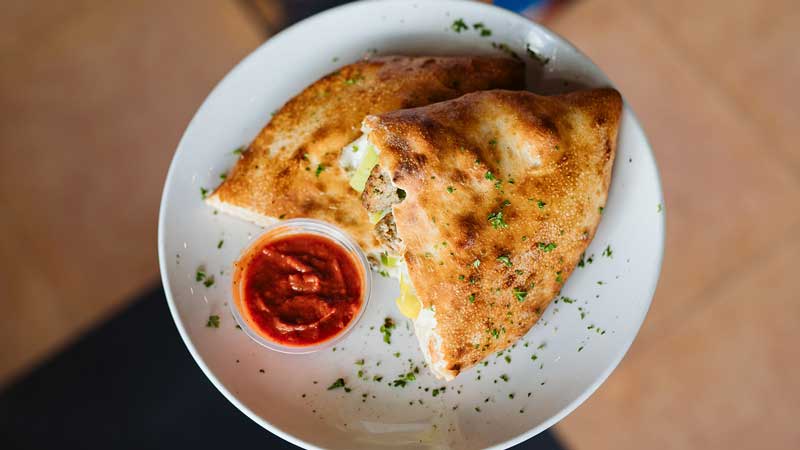 a calzone on a plate